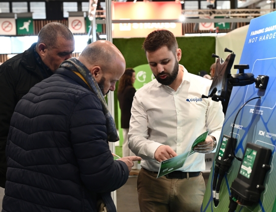 Visitors exploring the Cojali stand