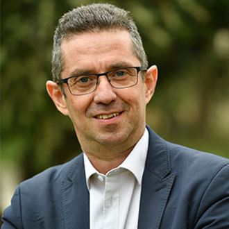 Portrait of the President of the CENECA, Jérôme Despey, outdoors